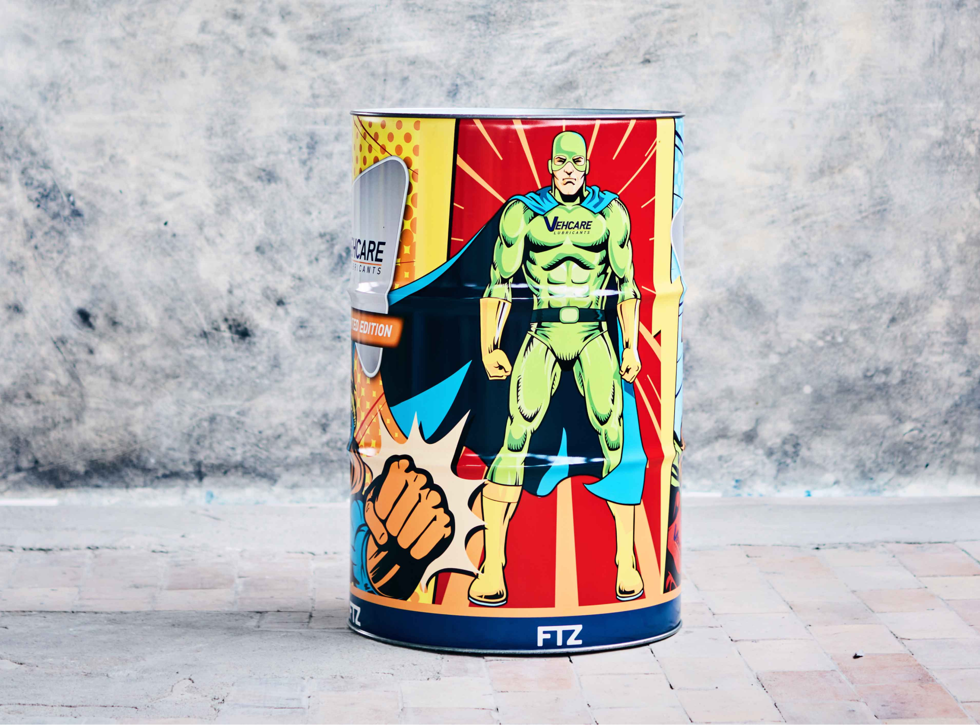 Metal barrel with superhero print